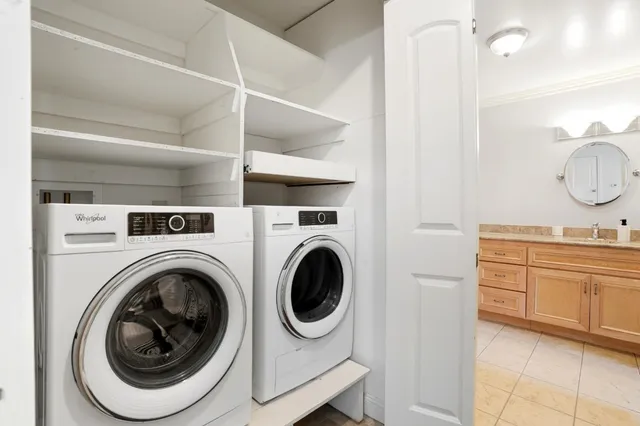a view of a balcony with furniture