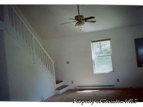 169 Janes Road Union Dale, PA 18470 - Photo 3 of 4 a view of entryway and hall with wooden floor