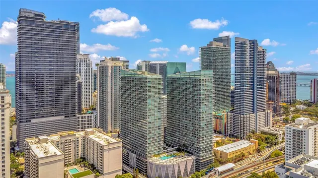 a view of a city with tall buildings