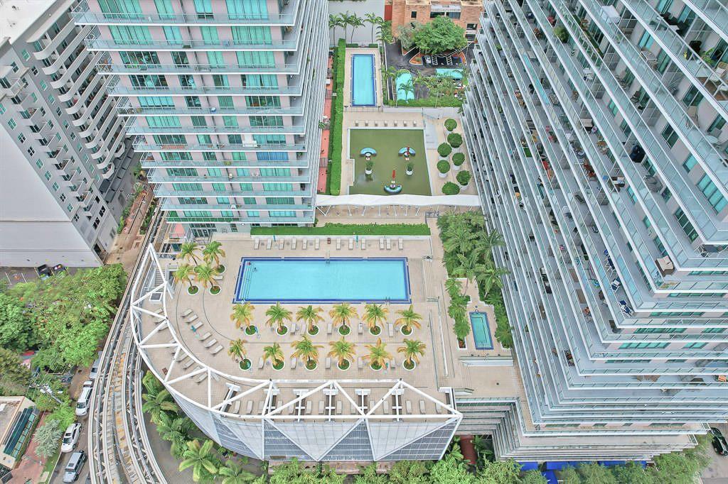 1111 Southwest 1st Avenue, Unit 1224N Miami, FL 33130 - Photo 23 of 37 a view of a wooden door with a bench