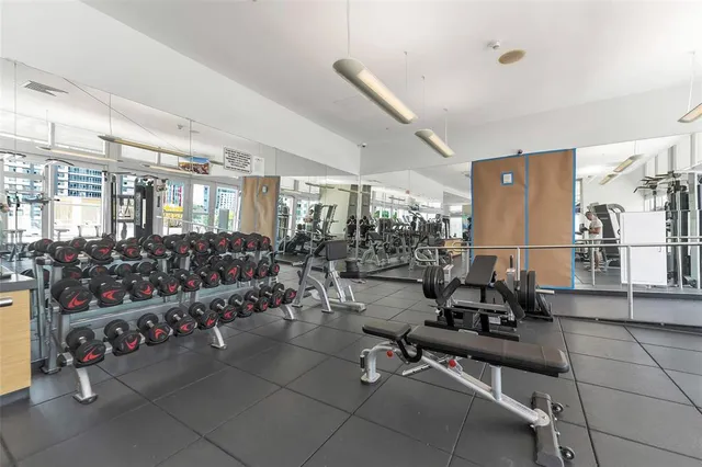 a view of a swimming pool with a lounge chairs