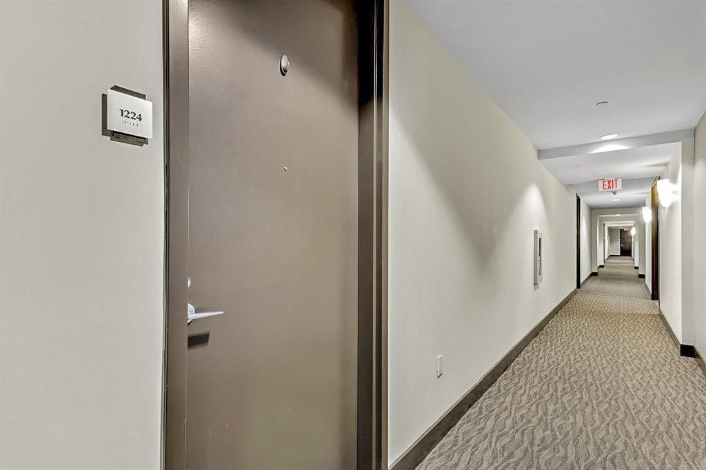 1111 Southwest 1st Avenue, Unit 1224N Miami, FL 33130 - Photo 3 of 37 a view of a hallway with closet and wooden floor