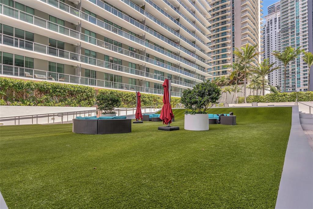 1111 Southwest 1st Avenue, Unit 1224N Miami, FL 33130 - Photo 35 of 37 a house view with a sitting space and garden