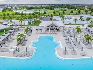 8069 Rolling Shell Trail Wesley Chapel, FL 33545 - Photo 22 of 26 a view of swimming pool with a table and chairs
