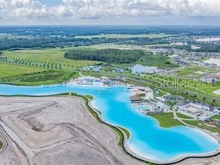 8069 Rolling Shell Trail Wesley Chapel, FL 33545 - Photo 23 of 26 a view of a swimming pool with a yard