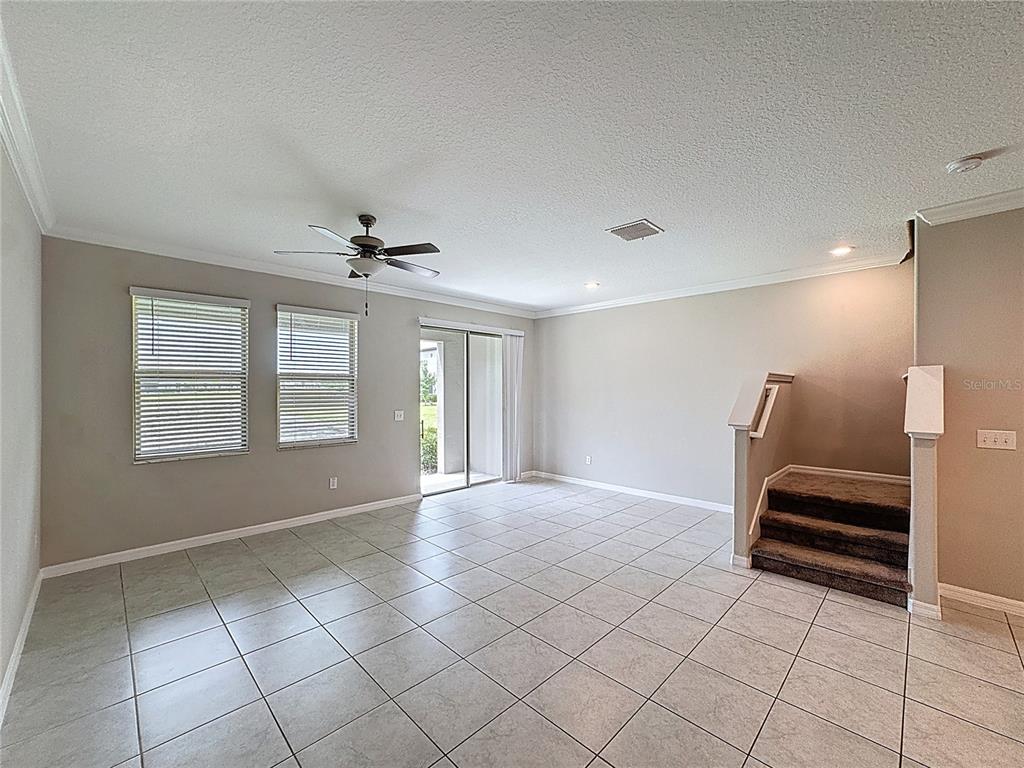 8069 Rolling Shell Trail Wesley Chapel, FL 33545 - Photo 9 of 26 a view of livingroom with hardwood