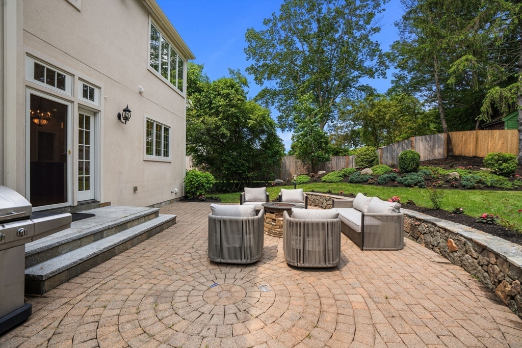 22 Scotney Road Newton, MA 02467 - Photo 40 of 42 a view of a patio with chairs and plants