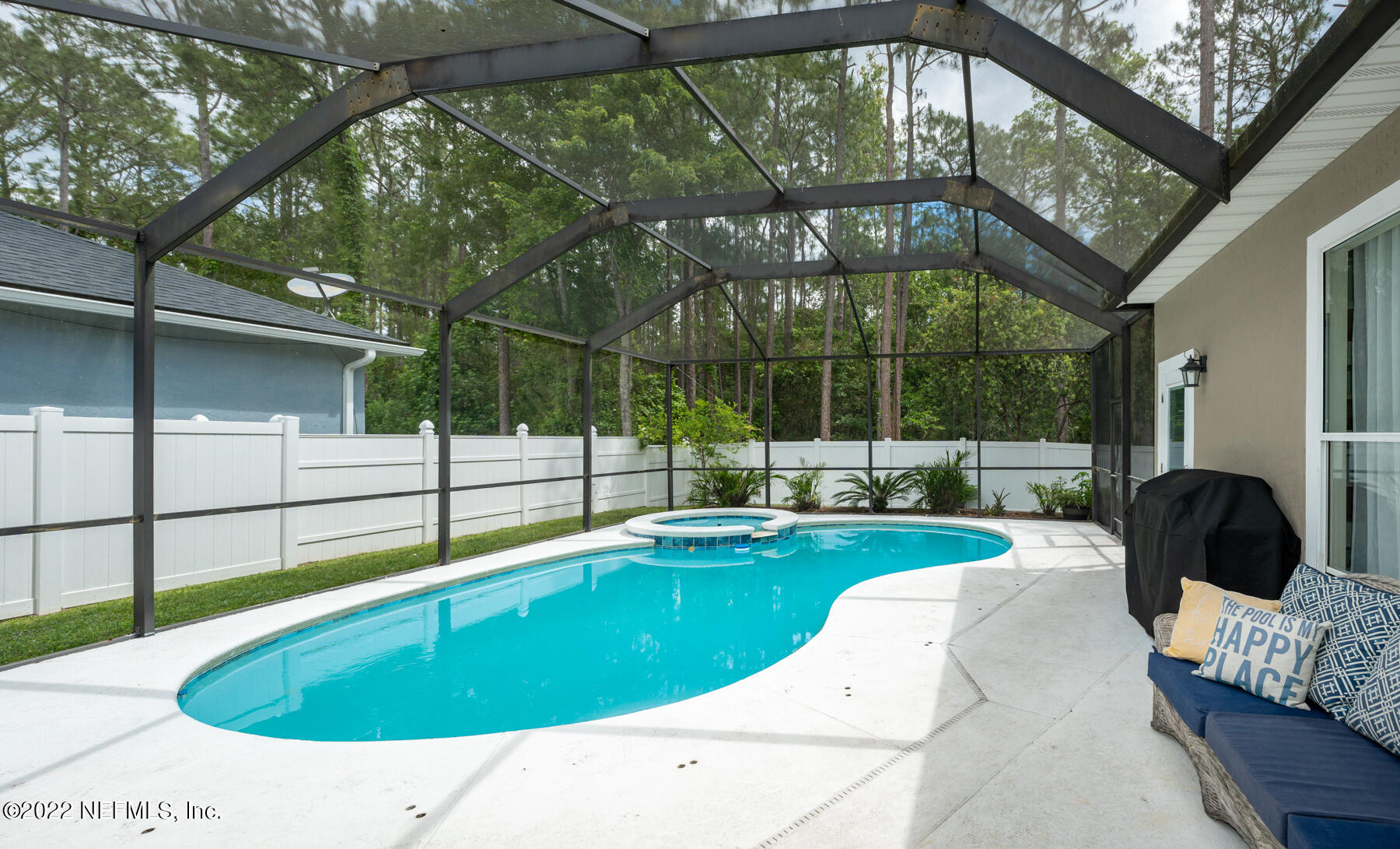 8713 Reedy Branch Drive Jacksonville, FL 32256 - Photo 17 of 38 a view of a swimming pool with a patio and a yard