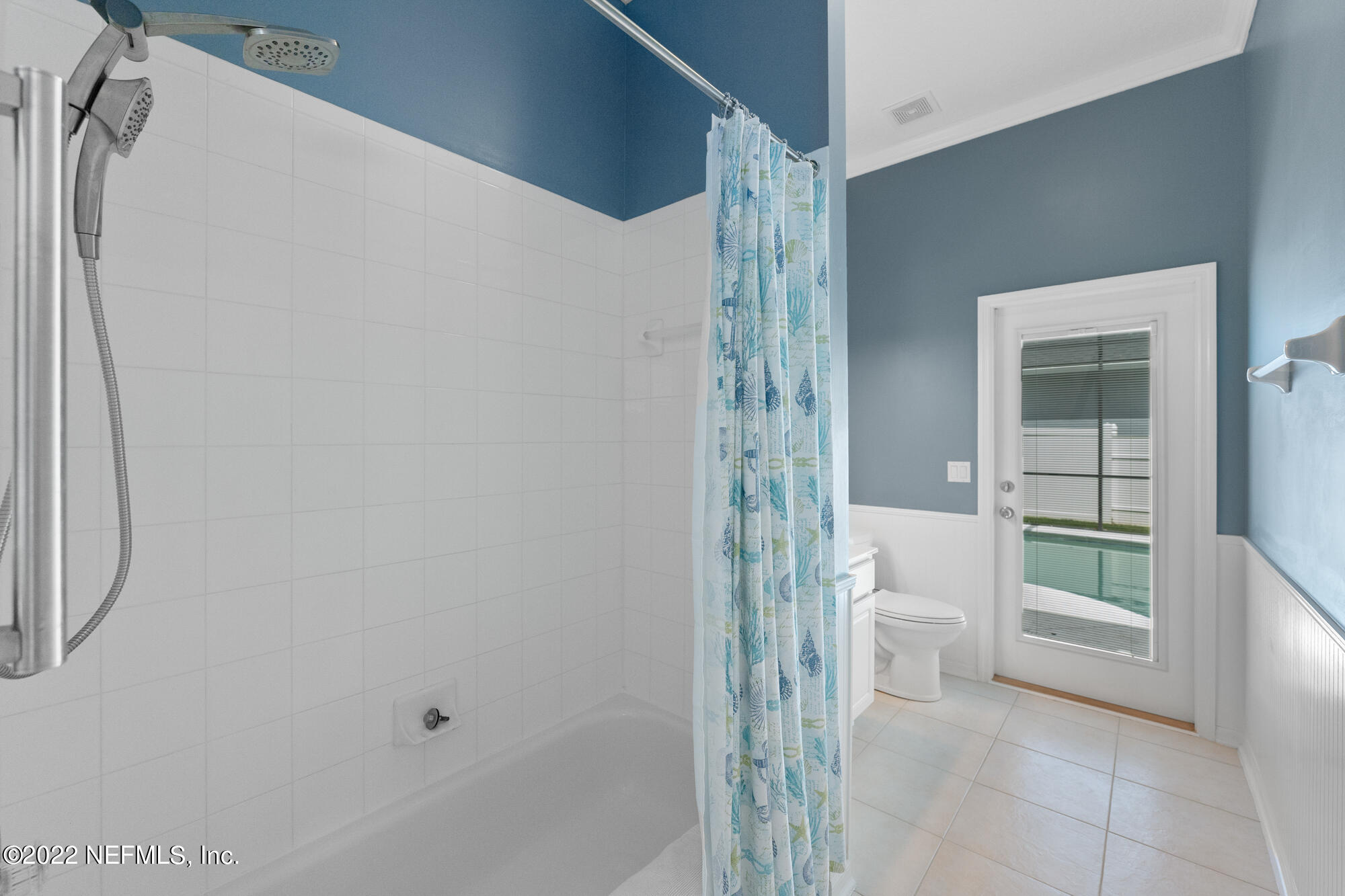 8713 Reedy Branch Drive Jacksonville, FL 32256 - Photo 25 of 38 a bathroom with a shower and a sink