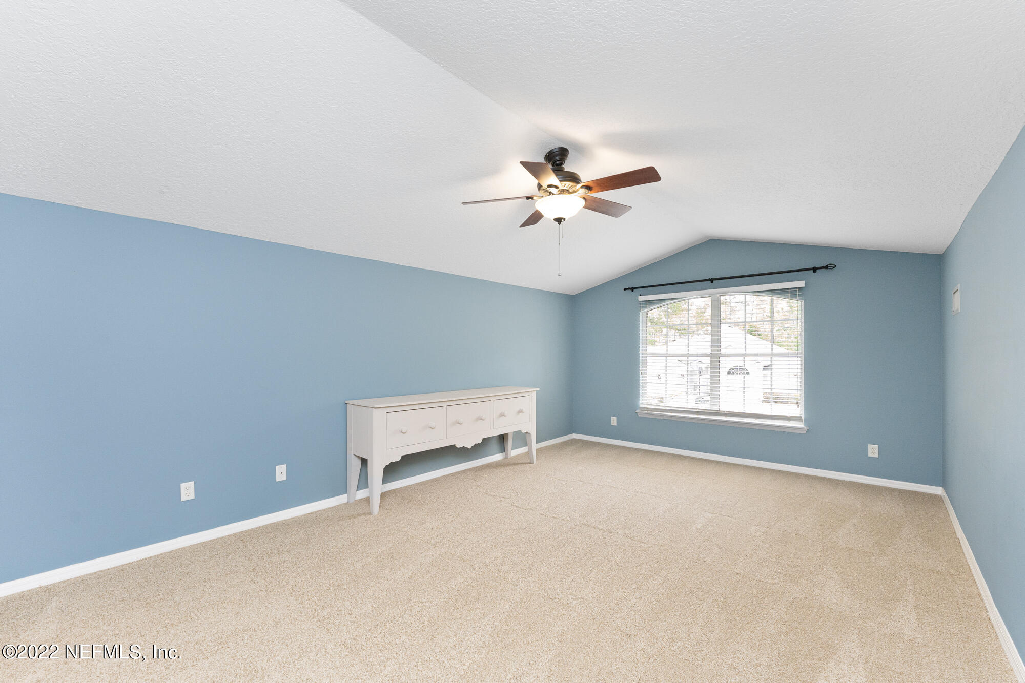 8713 Reedy Branch Drive Jacksonville, FL 32256 - Photo 31 of 38 a view of an empty room with a window