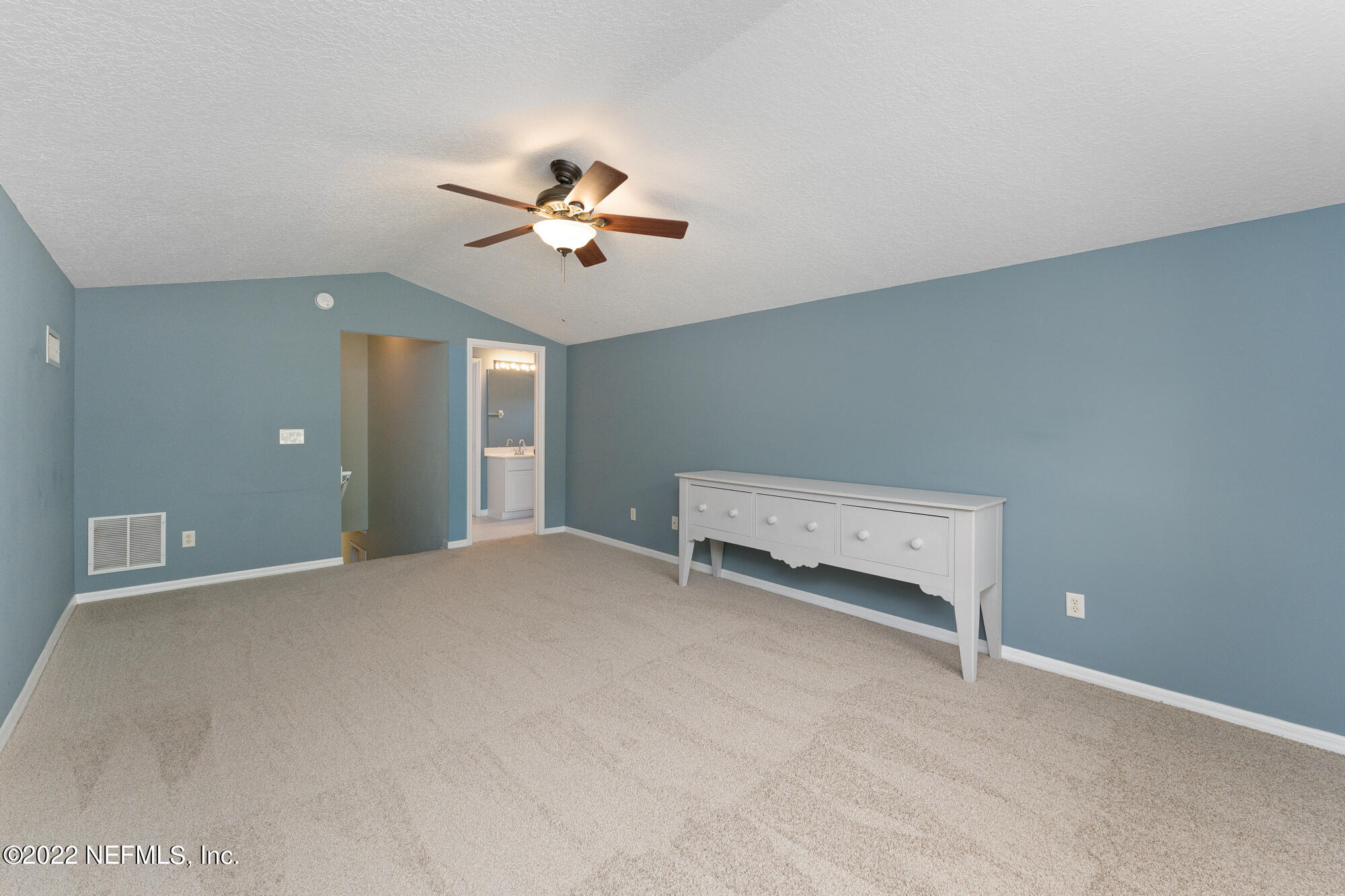 8713 Reedy Branch Drive Jacksonville, FL 32256 - Photo 32 of 38 a view of room with a ceiling fan