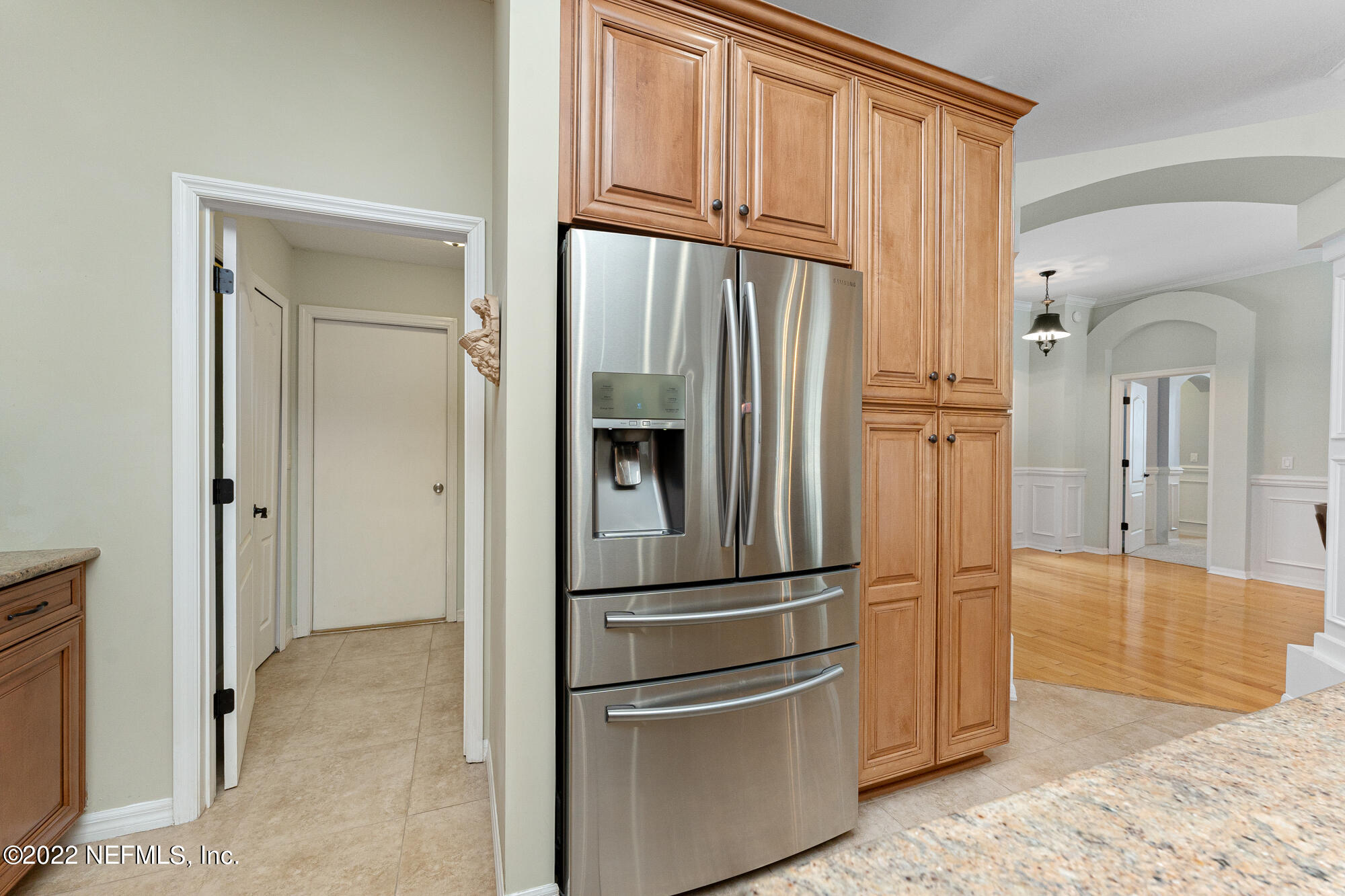 8713 Reedy Branch Drive Jacksonville, FL 32256 - Photo 5 of 38 a view of kitchen with stainless steel appliances wooden floor and cabinet