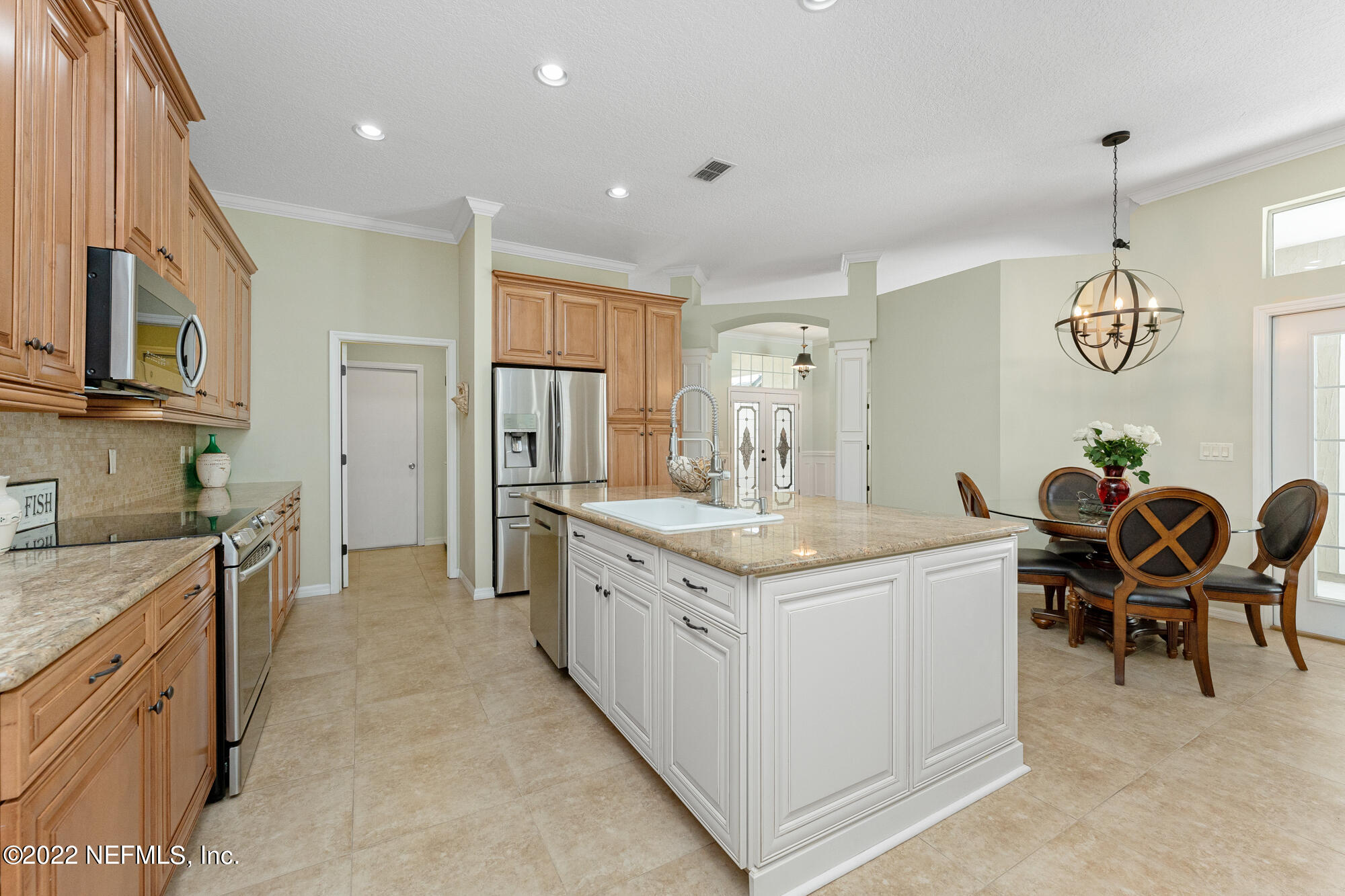 8713 Reedy Branch Drive Jacksonville, FL 32256 - Photo 6 of 38 a kitchen with a sink counter top space and appliances