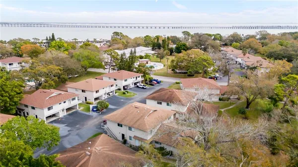 an aerial view of a houses with outdoor space