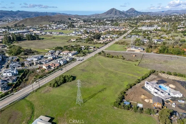 a view of a city with mountains in the background