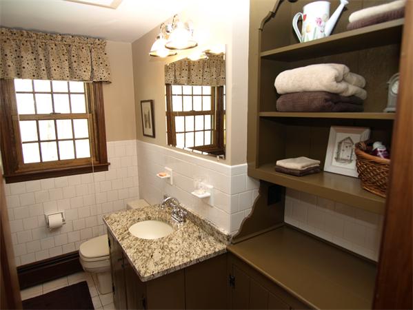 69 Teele Road Bolton, MA 01740 - Photo 13 of 17 a bathroom with a sink and a mirror