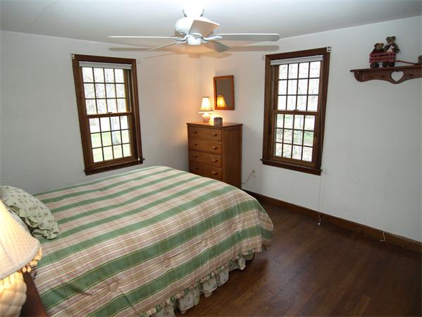 69 Teele Road Bolton, MA 01740 - Photo 14 of 17 a bedroom with a bed and a window