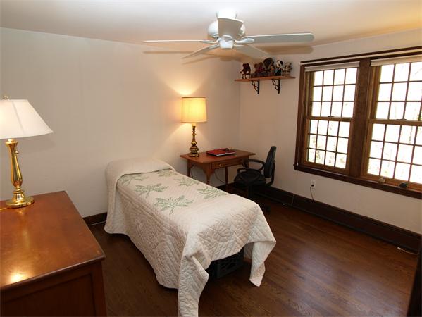 69 Teele Road Bolton, MA 01740 - Photo 15 of 17 a bed room with a bed and a lamp