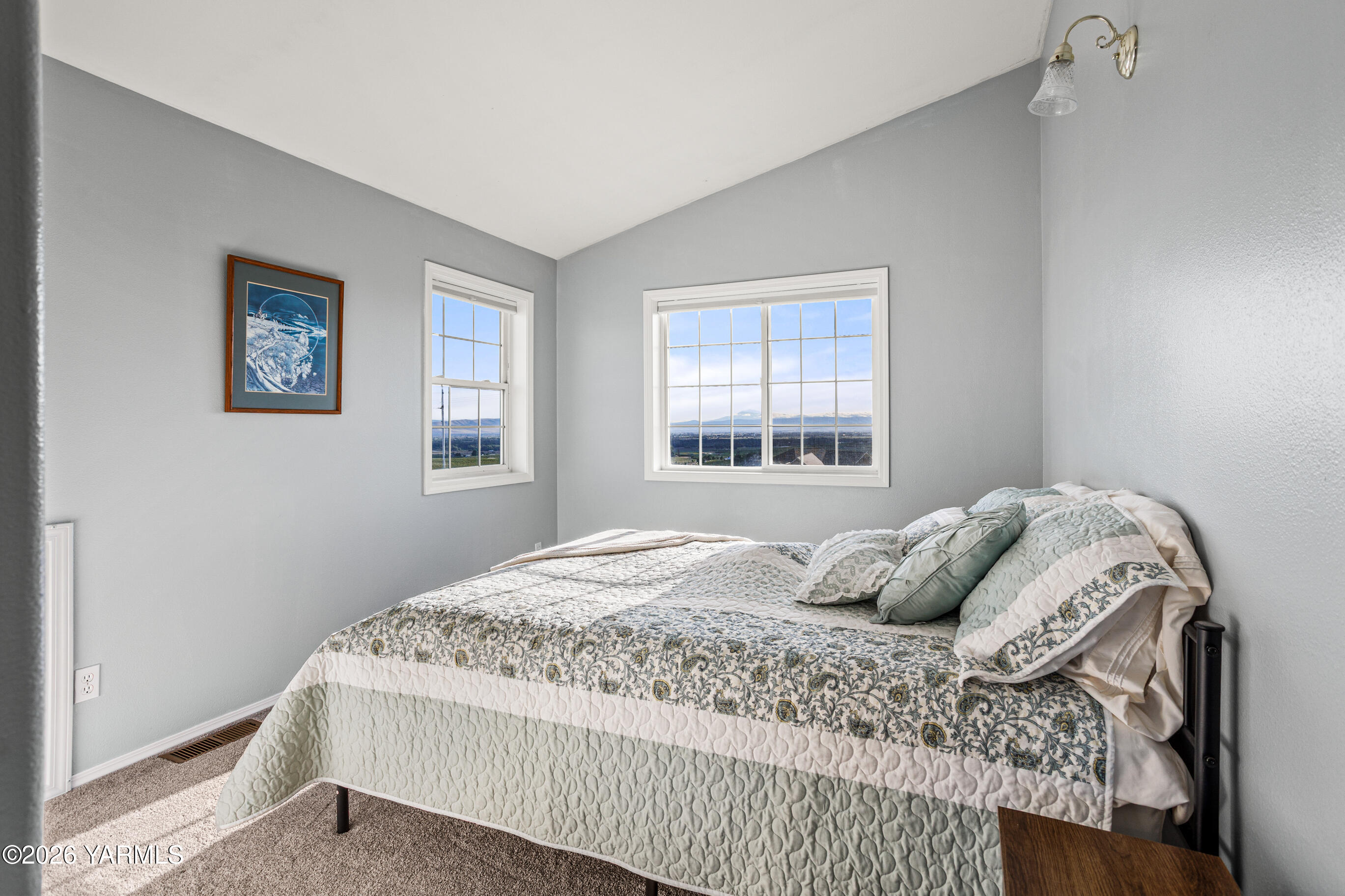 5060 Lombard Loop Road Zillah, WA 98953 - Photo 40 of 65 a bedroom with a bed and a window