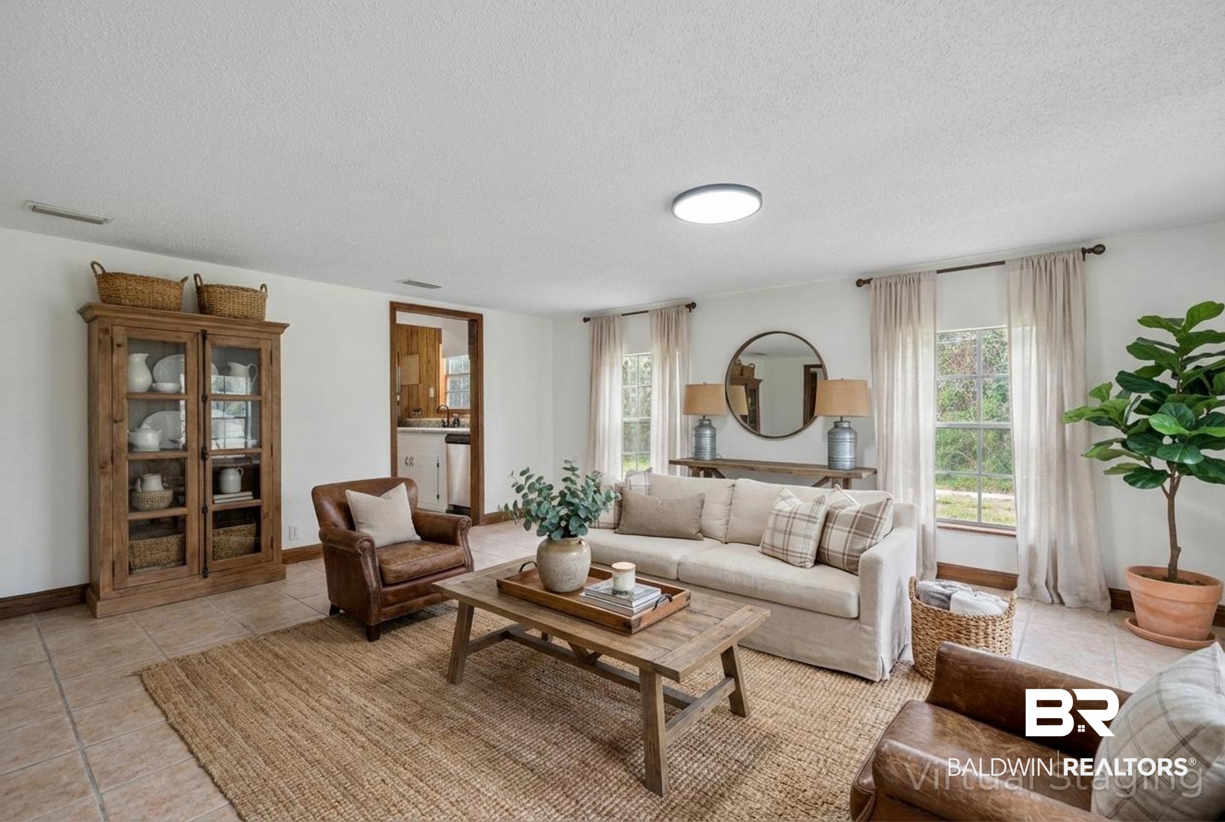 35780 Spring Road North Stapleton, AL 36578 - Photo 6 of 41 Living room with light tile patterned floors, a textured ceiling, and healthy amount of natural light
