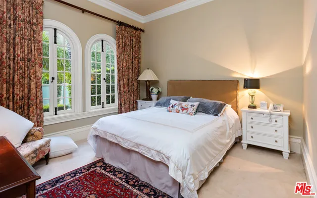 a view of a livingroom with furniture and a fireplace