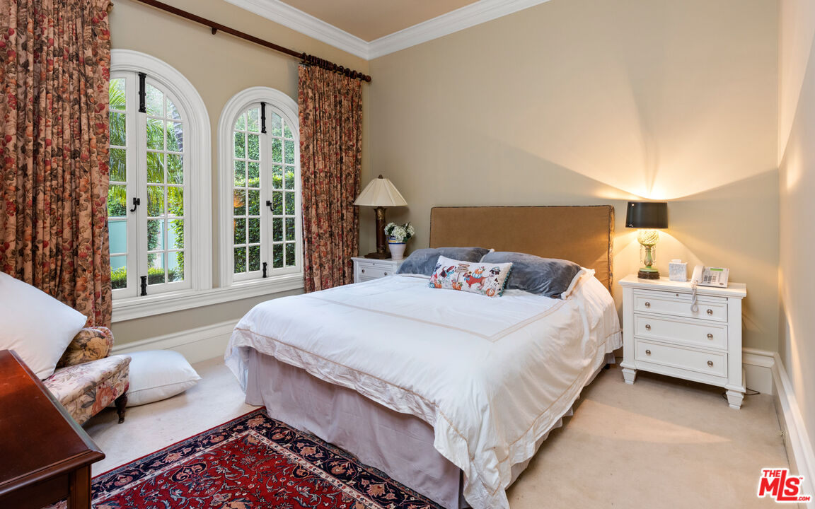 2733 Sycamore Canyon Road Montecito, CA 93108 - Photo 28 of 30 a bedroom with a bed and a large window