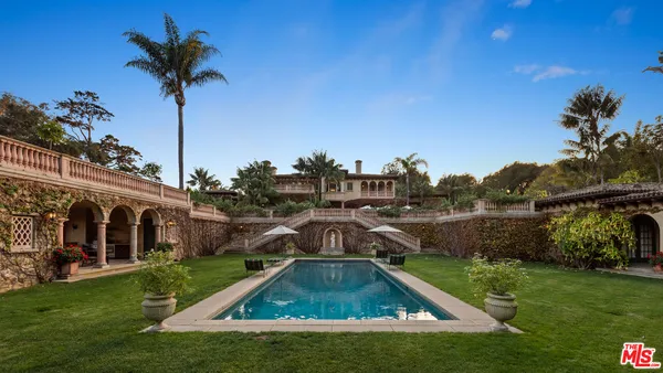 a view of a building with a swimming pool