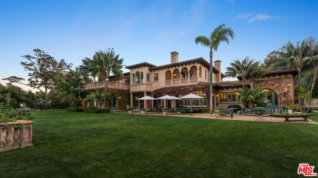 a view of a house with a swimming pool