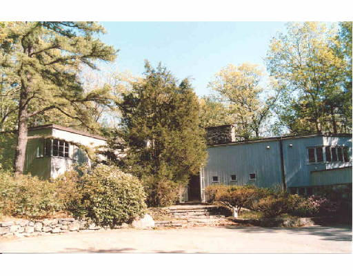 152 Trapelo Road Lincoln, MA 01773 - Photo 3 of 5 front view of a house with a yard