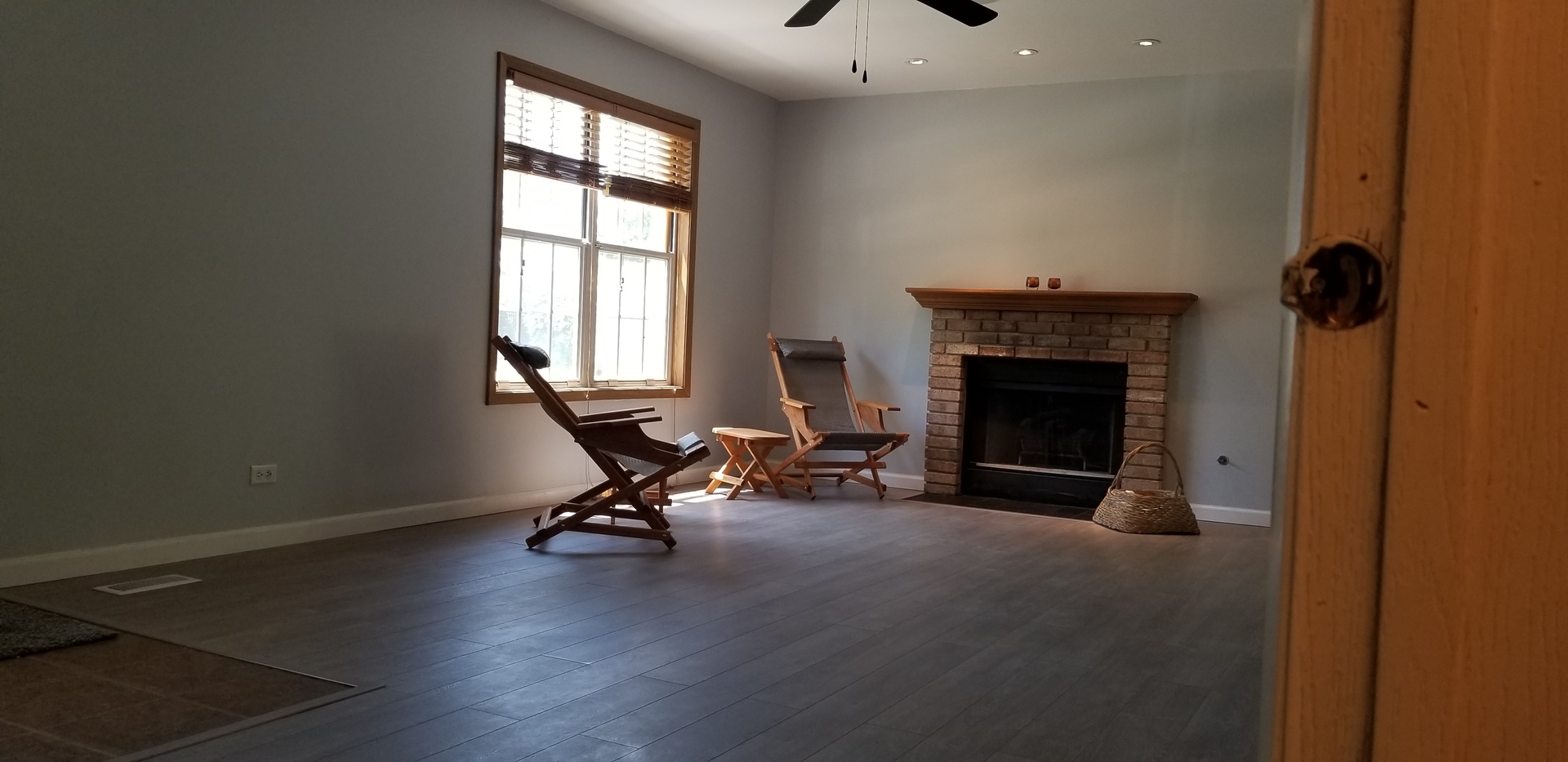 4484 Brookhaven Road Gurnee, IL 60031 - Photo 2 of 13 a view of a livingroom with a fireplace and a window