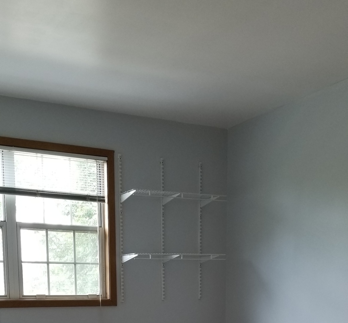 4484 Brookhaven Road Gurnee, IL 60031 - Photo 10 of 13 an empty room with a window