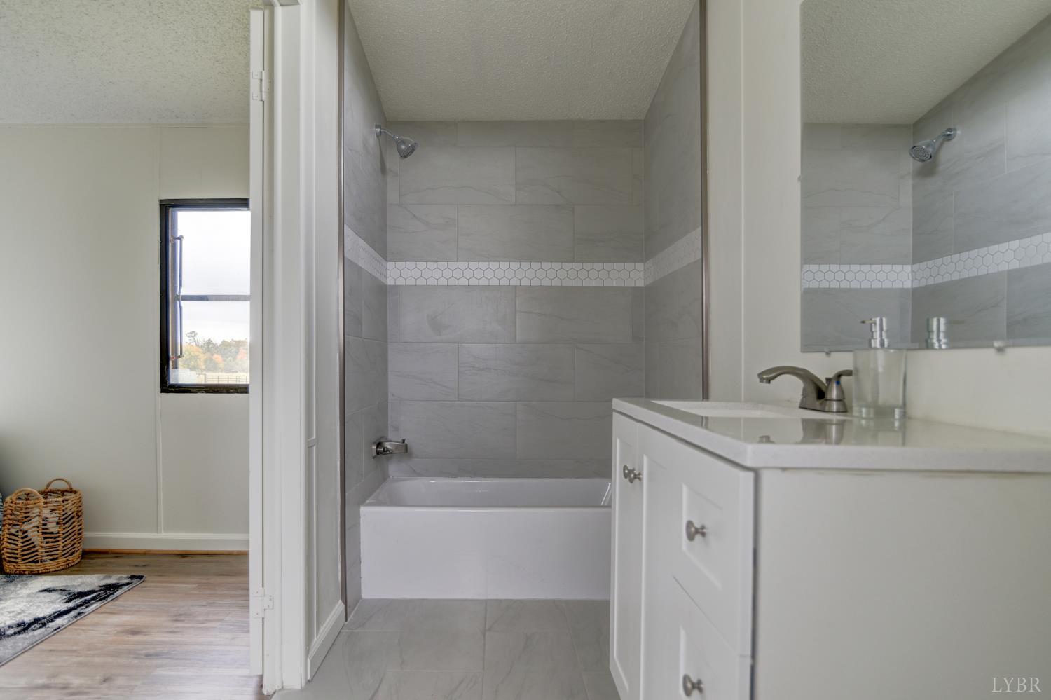 195 Dews Road Hurt, VA 24563 - Photo 15 of 37 a bathroom with a sink and a mirror