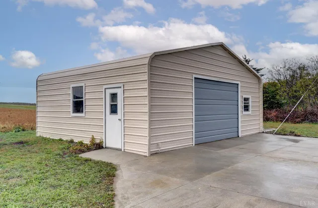 a view of a backyard with a car parked