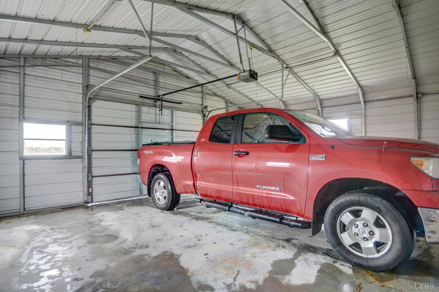 195 Dews Road Hurt, VA 24563 - Photo 32 of 37 a view of a car in garage