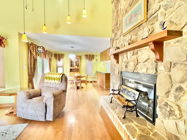 a view of balcony with wooden floor and outdoor space