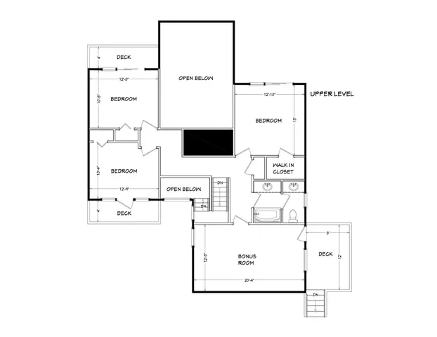 a view of a dry yard with mountains in the background
