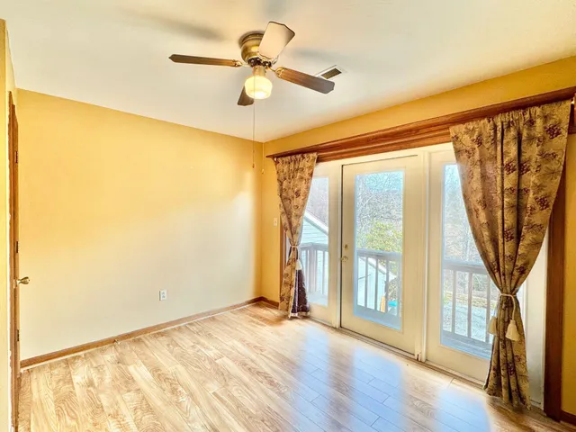 a view of a backyard of the house