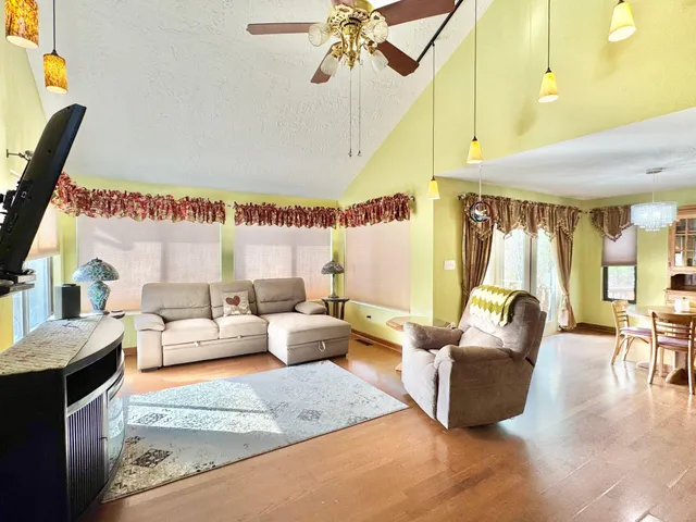 a kitchen with stainless steel appliances granite countertop a sink and cabinets