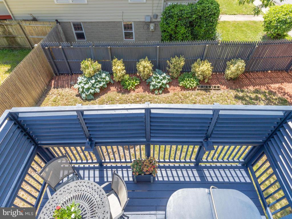 7899 Chicago Avenue Silver Spring, MD 20910 - Photo 38 of 49 View of main level deck & rear yard from Master.