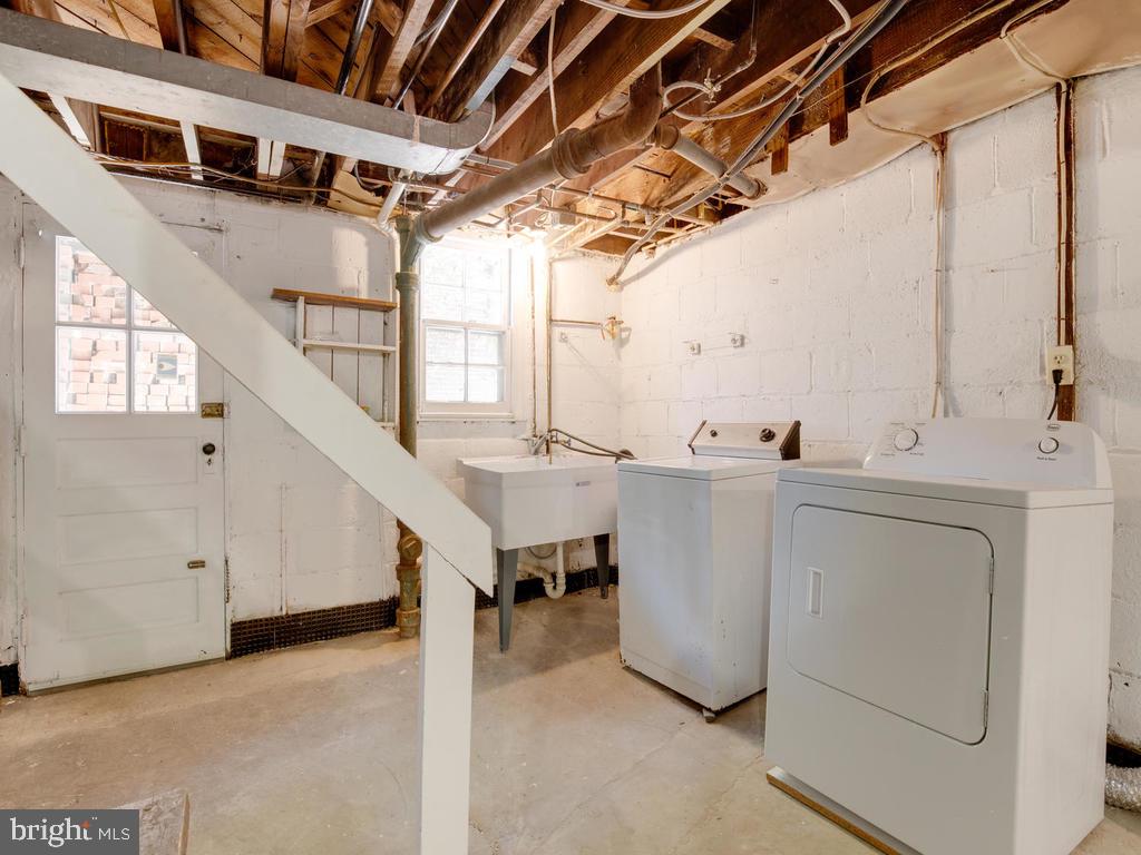 7899 Chicago Avenue Silver Spring, MD 20910 - Photo 41 of 49 Washer, Dryer, Double Laundry Sink & Exit.
