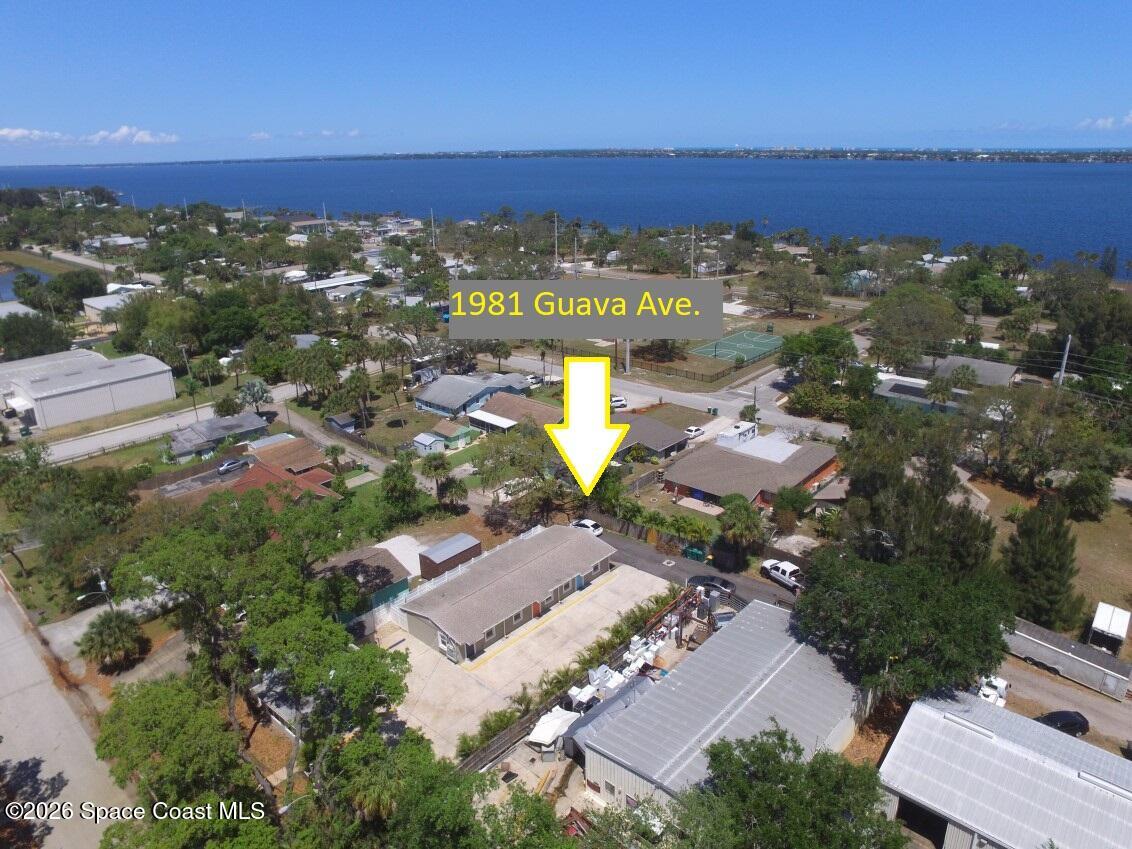 1981 Guava Avenue, Unit 101 Melbourne, FL 32935 - Photo 15 of 22 Aerial with Arrow