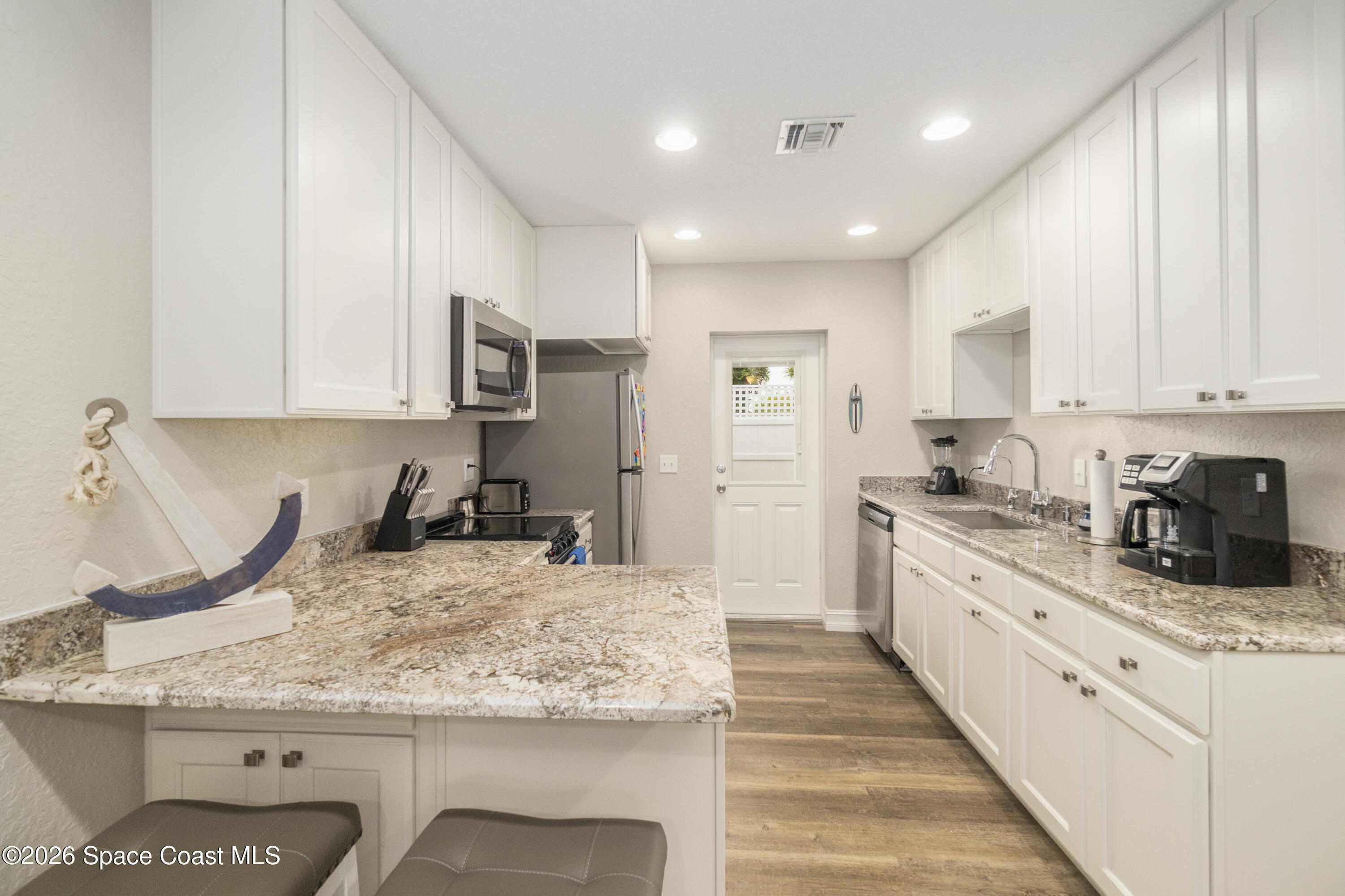 1981 Guava Avenue, Unit 101 Melbourne, FL 32935 - Photo 4 of 22 Unit 101 Kitchen 1