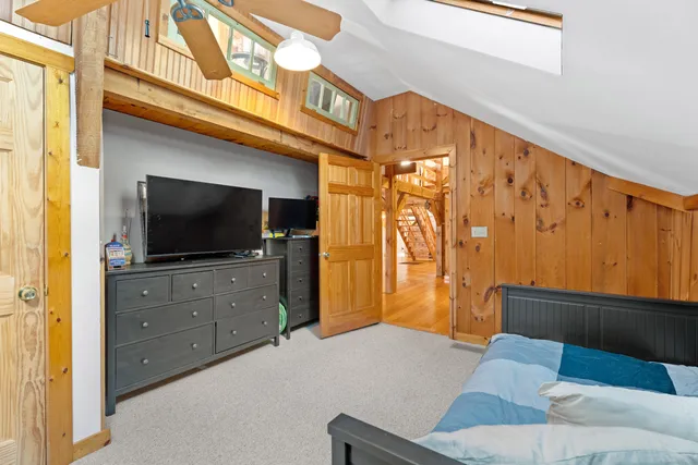 a view of a livingroom with chairs