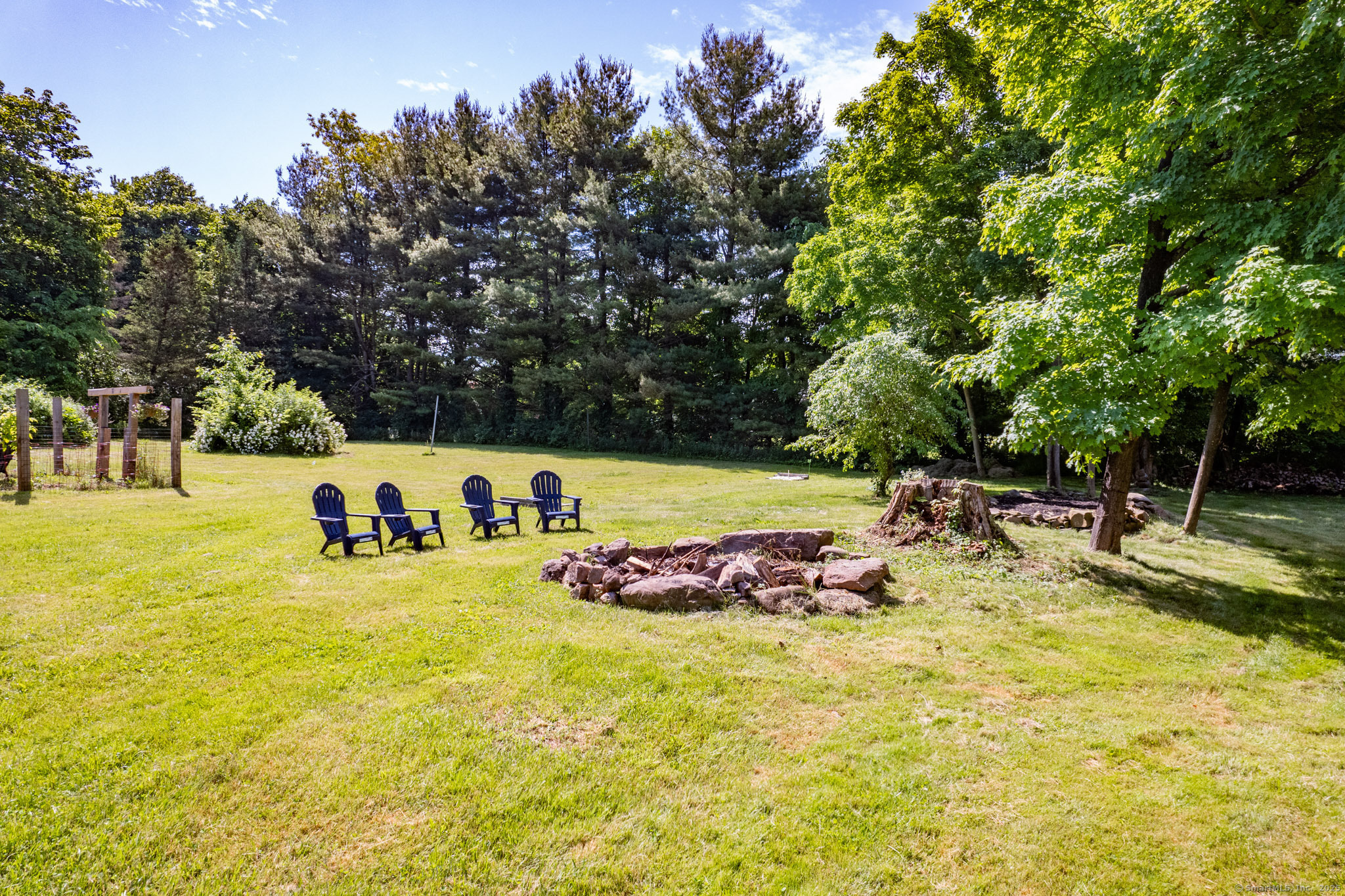 26 Old Wallingford Road Durham, CT 06422 - Photo 35 of 38 a view of a swimming pool with a lawn chairs and plants