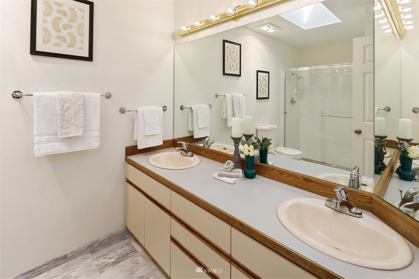605 5th Street, Unit B 303 Kirkland, WA 98033 - Photo 15 of 18 a bathroom with a sink and a mirror