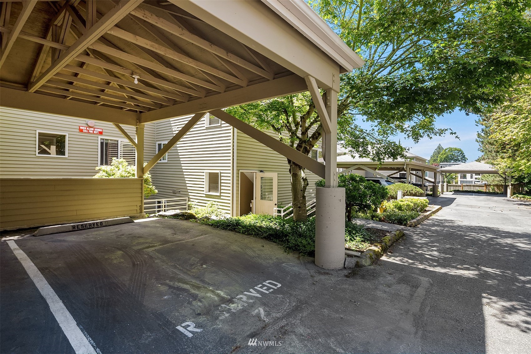 605 5th Street, Unit B 303 Kirkland, WA 98033 - Photo 17 of 18 a view of a house with a patio