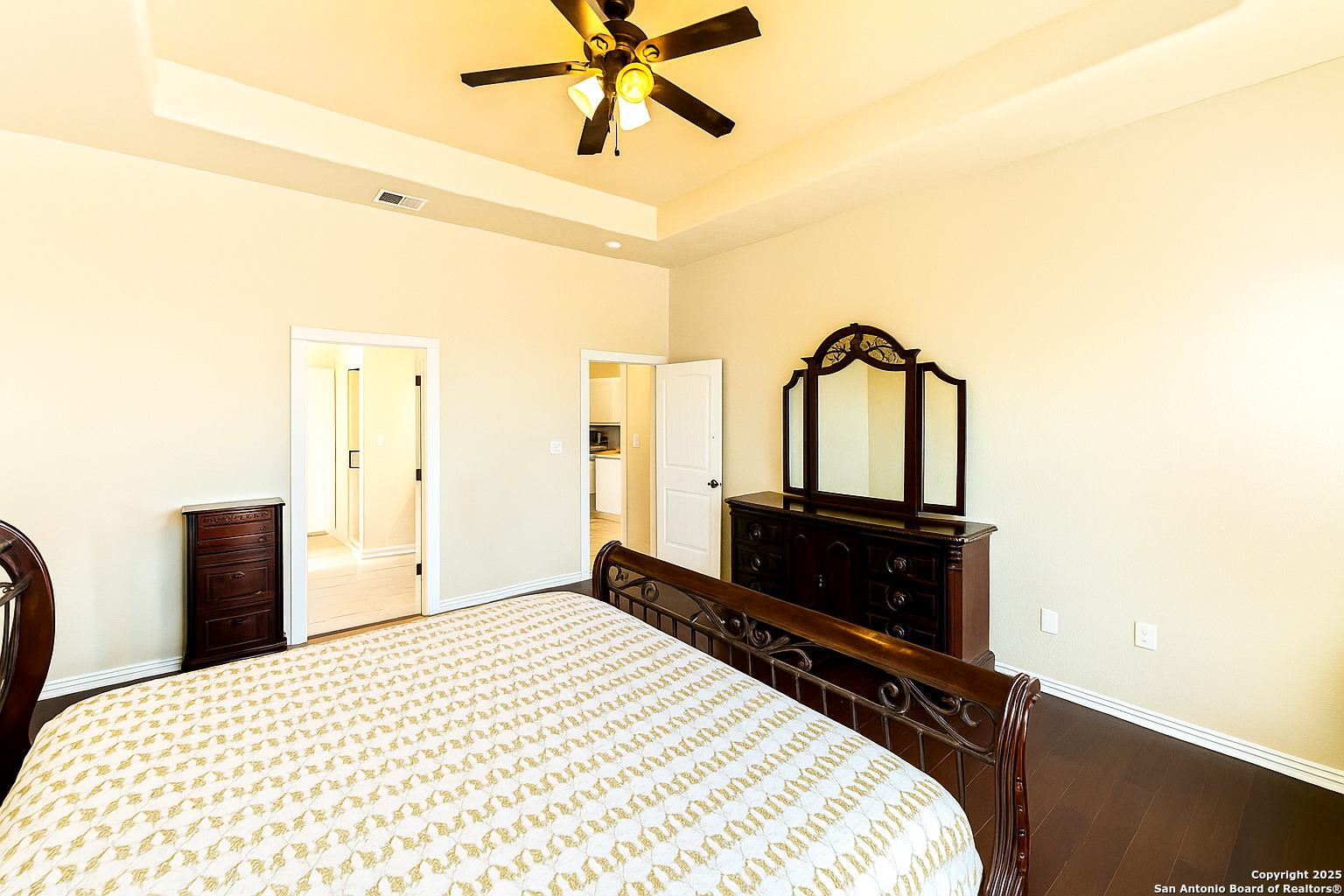 2211 Geneva Street Castroville, TX 78009 - Photo 14 of 41 a bedroom with a bed and a dresser