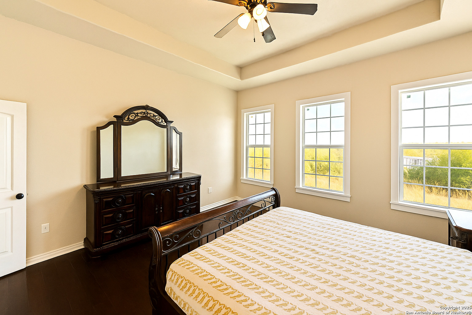 2211 Geneva Street Castroville, TX 78009 - Photo 15 of 41 a bedroom with a bed and a dresser