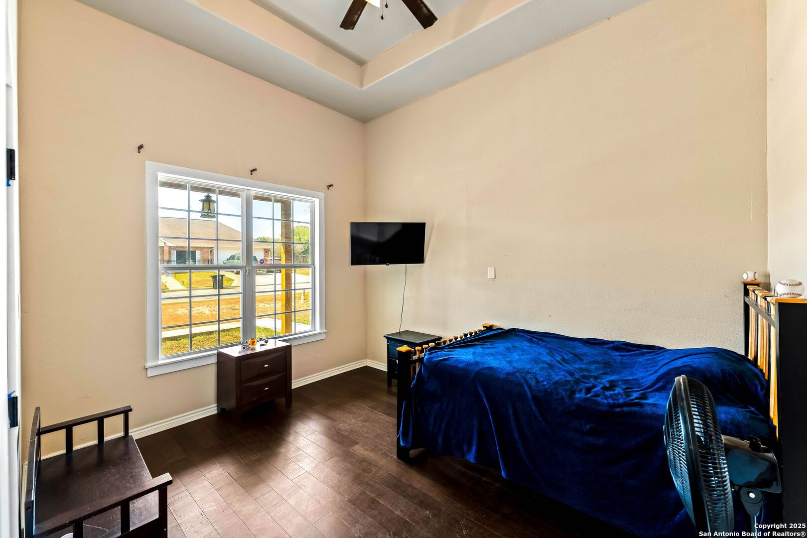 2211 Geneva Street Castroville, TX 78009 - Photo 19 of 41 a bedroom with a bed and a window