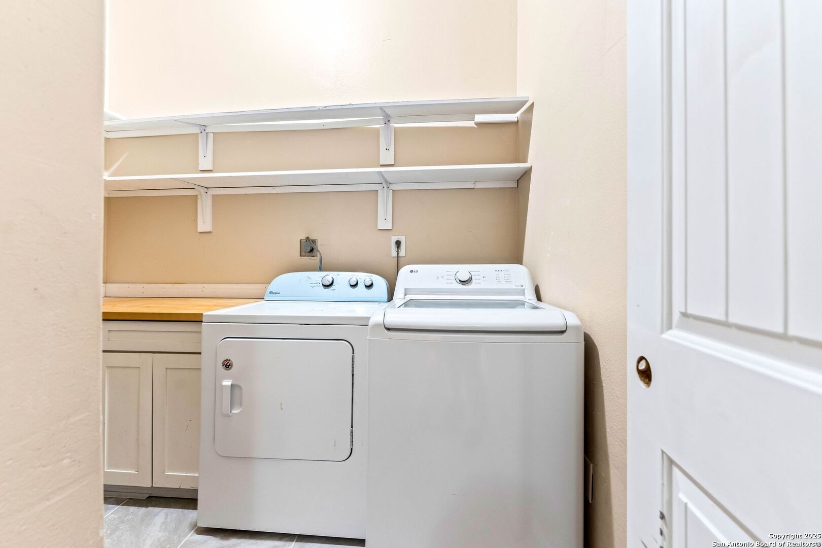 2211 Geneva Street Castroville, TX 78009 - Photo 30 of 41 a utility room with dryer and washer